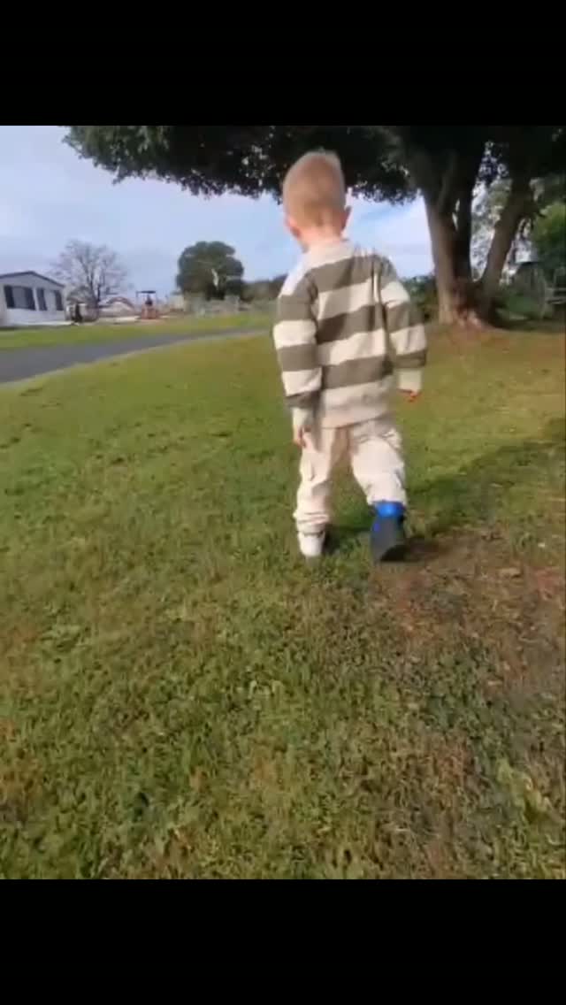 Henry playing outdoors